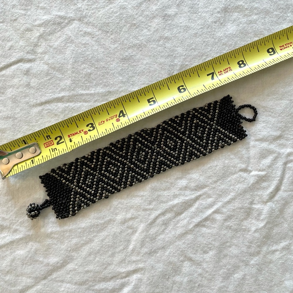 3/10$ Black and silver beaded cuff bracelet